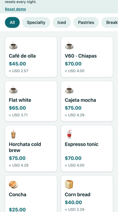 Café POS on a phone: the demo café catalog with prices in pesos and dollars.